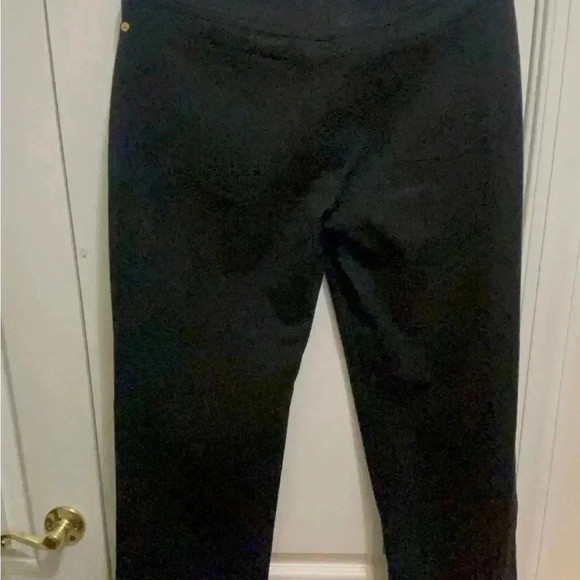 St. John black jeans in new condition . Gorgeous hardware around the belts . - Picture 4 of 14